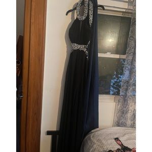 Long prom dress with a lot of jewelry beads